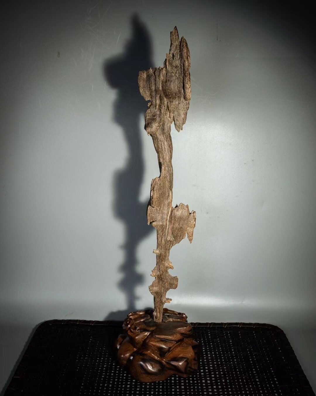Agarwood Wood Carving — Natural form agarwood wood carvings — minimal intervention, showcasing natural grain and resin. | agarwood wholesale Guangdong China