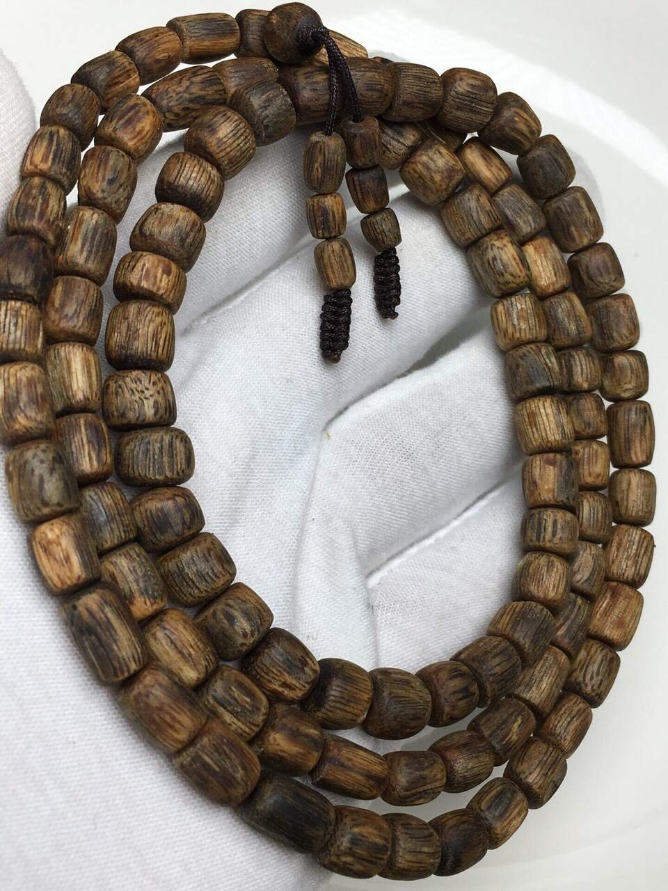 Agarwood Bracelet — Hand-strung plantation agarwood bracelets — 15 styles, wholesale pricing by weight at $18/g.