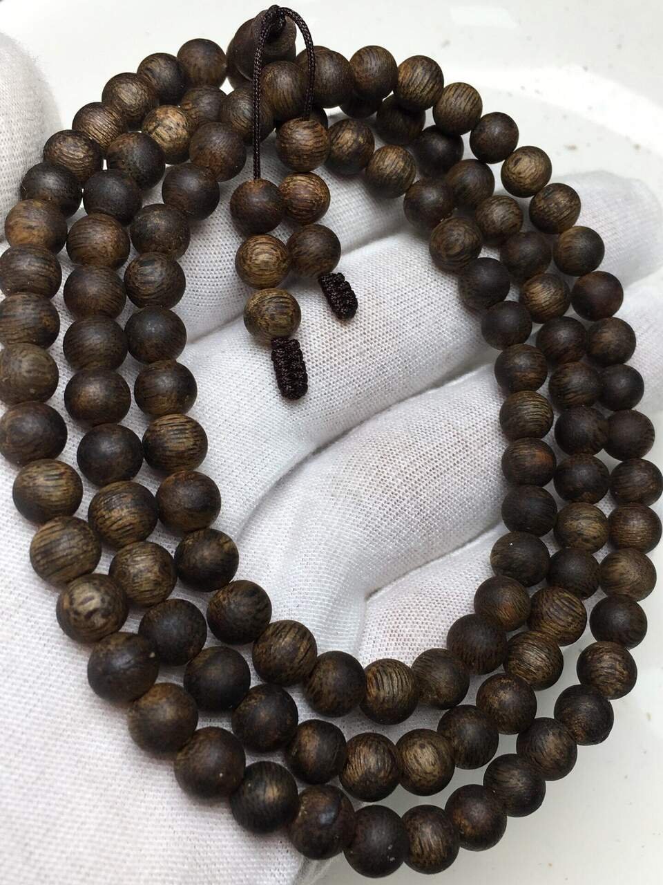Multi-Wrap Round Bead Agarwood Bracelet — Multi-wrap round bead agarwood bracelet — statement piece with layered natural oud fragrance. | agarwood wholesale Guangdong China
