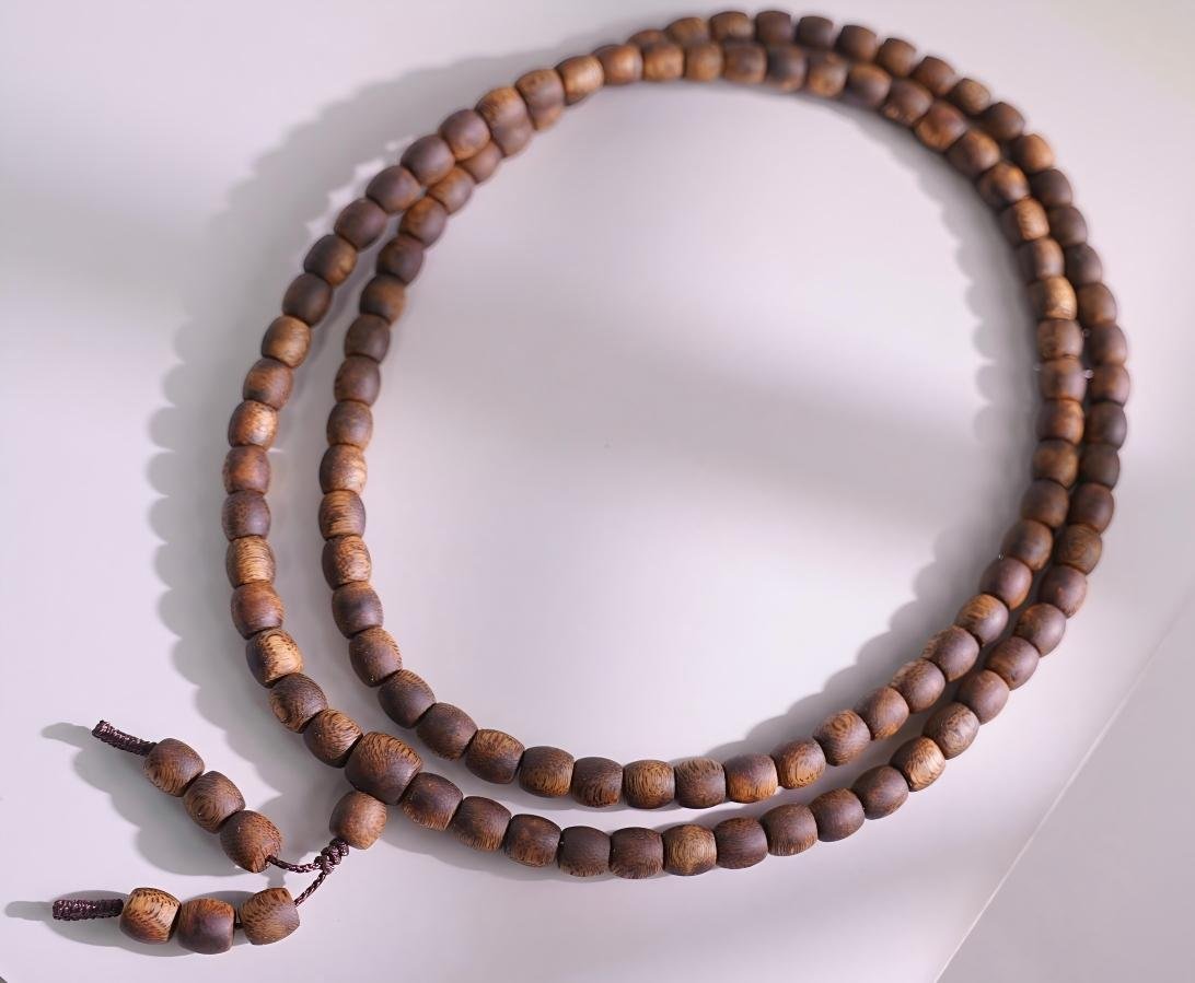 Multi-Wrap Drum Bead Agarwood Bracelet — Layered multi wrap drum bead agarwood bracelet — Aquilaria sinensis oud beads in stacked formation., image 4